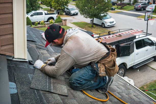 Professional Roofing technician working in Candler, NC